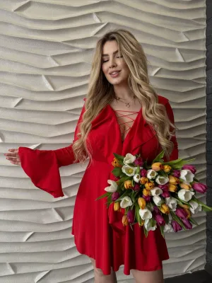 Dress with thin ties and ruffles